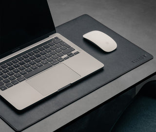 Laptop and mouse on the Small Black Leather Desk Mat