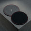 Microfibre backing of the Black with Red Detail Leather Coasters