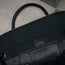 Inside pocket on the Black Leather Weekend Duffle Bag