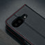 Camera cutout on the Black with Red Detail Leather Wallet Case for Google Pixel 9a
