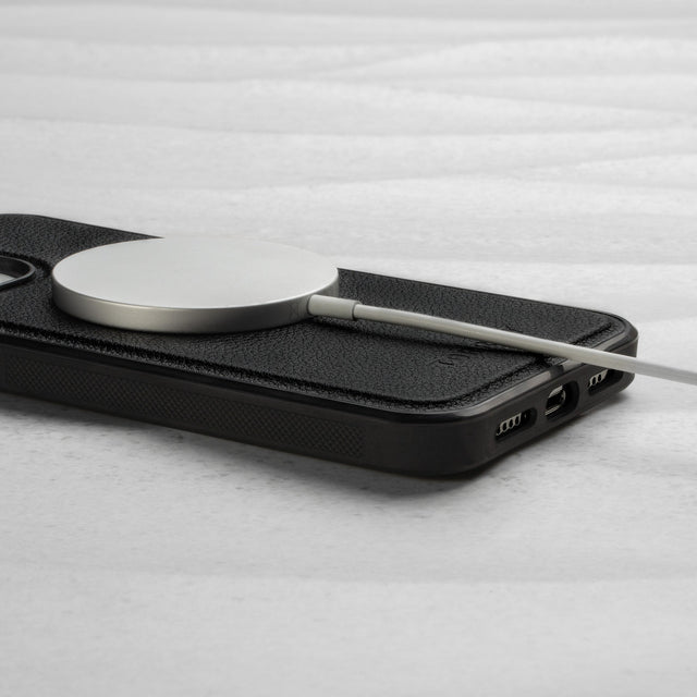 MagSafe charger attached to the Black Leather Bumper Case (with detachable cover) for iPhone 14 Pro
