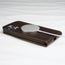 MagSafe charger attached to the Dark Brown Leather Flip Case for iPhone 14 Pro Max