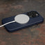 MagSafe charger attached to the Navy Blue Slimline Leather Bumper Case for iPhone 15 Pro