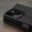 Camera cutout on the Black with Purple Detail Leather Wallet Case for iPhone 15 Pro