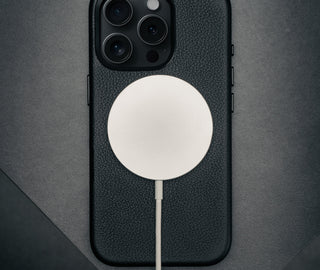 MagSafe charger on the Black Leather Slimline Bumper Case for iPhone 16 Pro