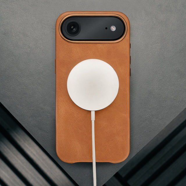 MagSafe charger attached to the Tan Leather Bumper Case for iPhone 17 Air