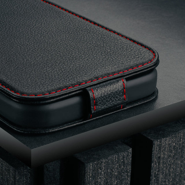 Magnetic closure clasp on the Black with Red Stitching Leather Flip Case for iPhone 17 Pro
