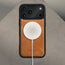 MagSafe charger attached to the bumper from the Dark Cherry Leather Detachable Case for iPhone 17 Pro