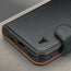 Close up of the Black Leather 2-in-1 Detachable Wallet Case for iPhone Ultra