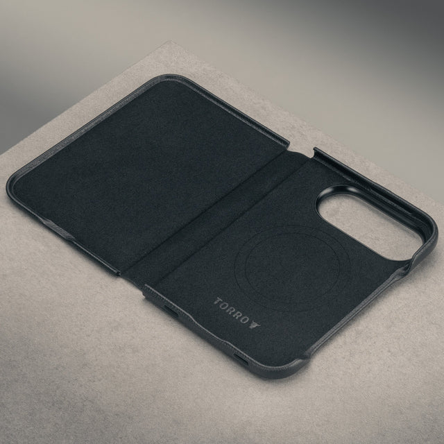 Microfibre fined frame of the Black with red detail Leather Folio Case (with Rotating Stand) for the iPhone Ultra