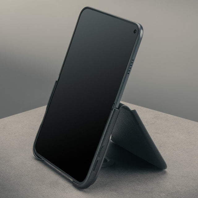 Phone open in portrait mode using the Black with red detail Leather Folio Case (with Rotating Stand) for the iPhone Ultra