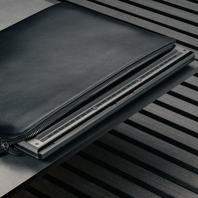 Laptop inside the Black Leather Laptop Sleeve with Zip Closure