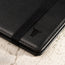 Close up of the TORRO bulls head logo on the Black Leather Passport holder