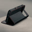 Stand function of the Black with Red Stitching Leather Case for the Google Pixel 11 Pro