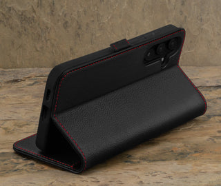 Stand feature of the Black with Red Detail Leather Case for Galaxy A55