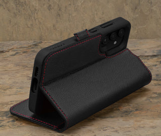 Stand feature of the Black with Red Detail Leather Wallet Case for Samsung Galaxy S24