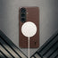Wireless charger attached to the Dark Brown Leather Bumper Case for Galaxy S26