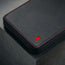 Close up of the heavy duty, long lasting zip on the Black Leather with Red Stitching Solo Travel Wallet