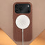 Wireless charger attached to the Brown Woven Fabric Bumper Case for iPhone 17 Pro Max
